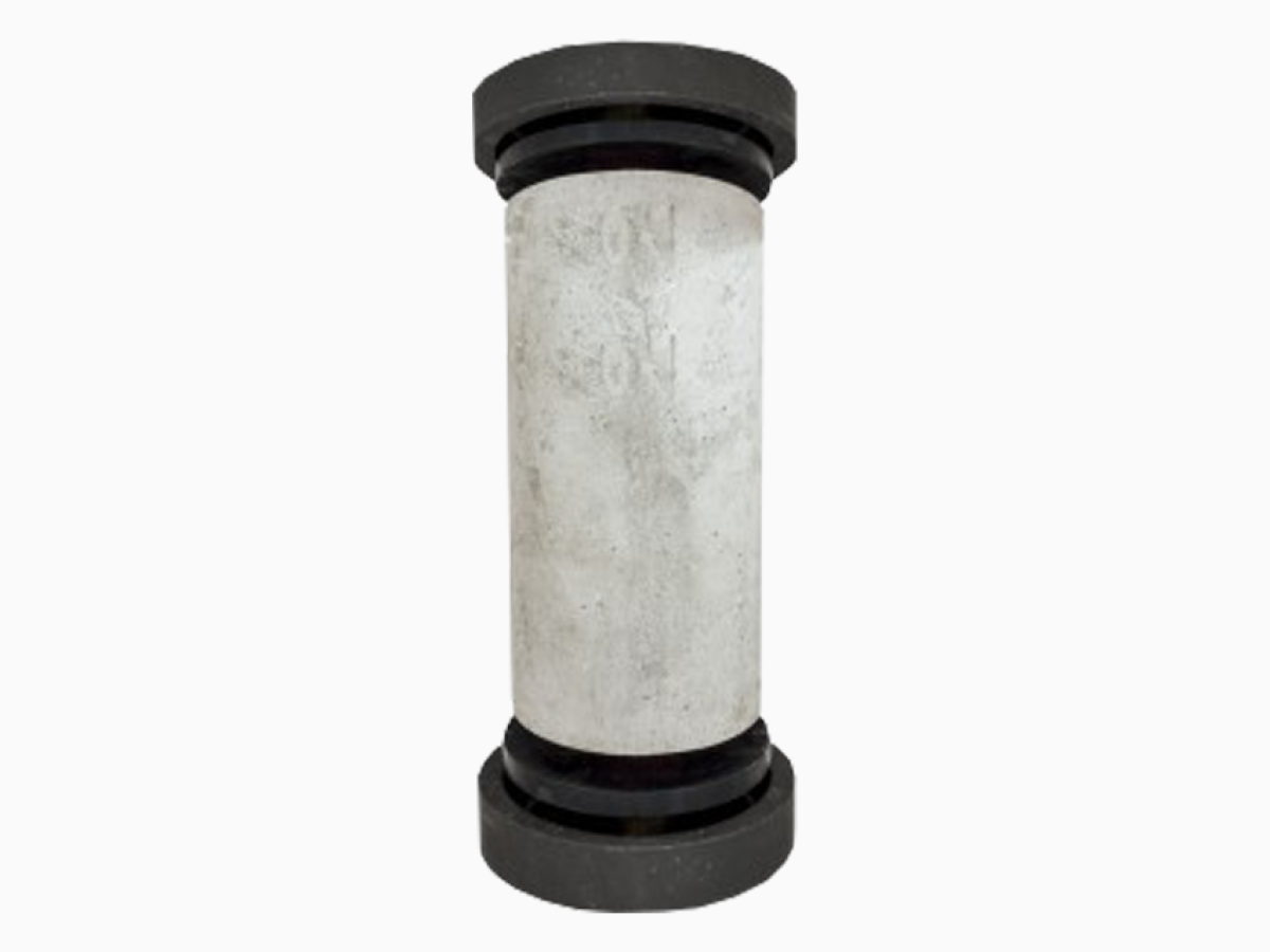 A concrete cylinder with an unbonded cap