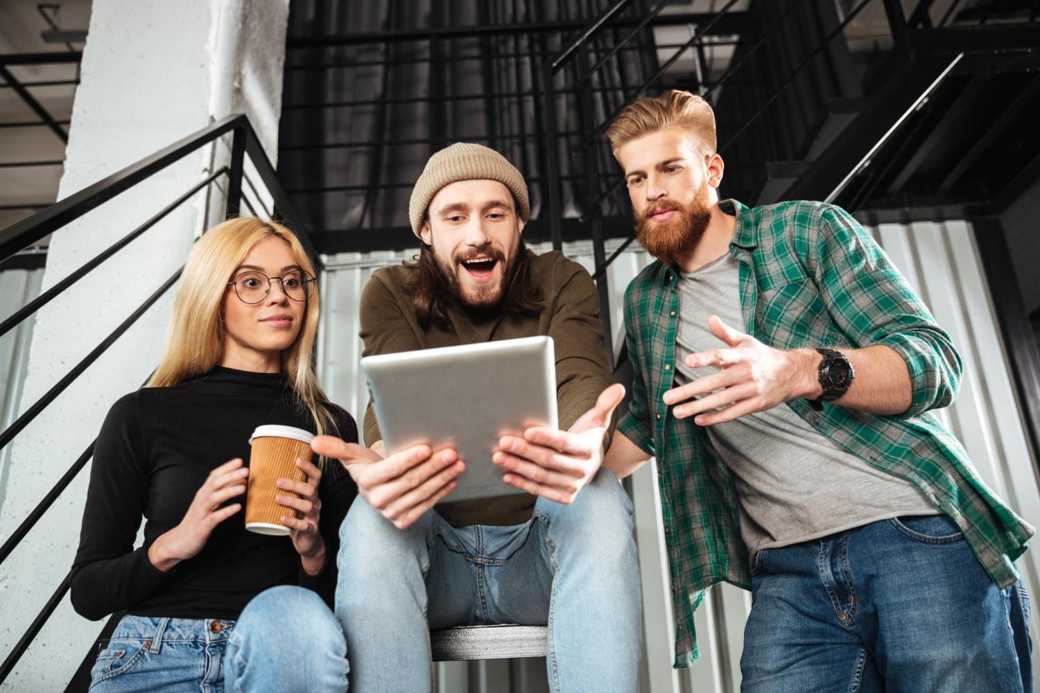 Three people happy about their dropshipping profits