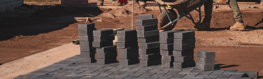 A driveway with a new stone paver installation