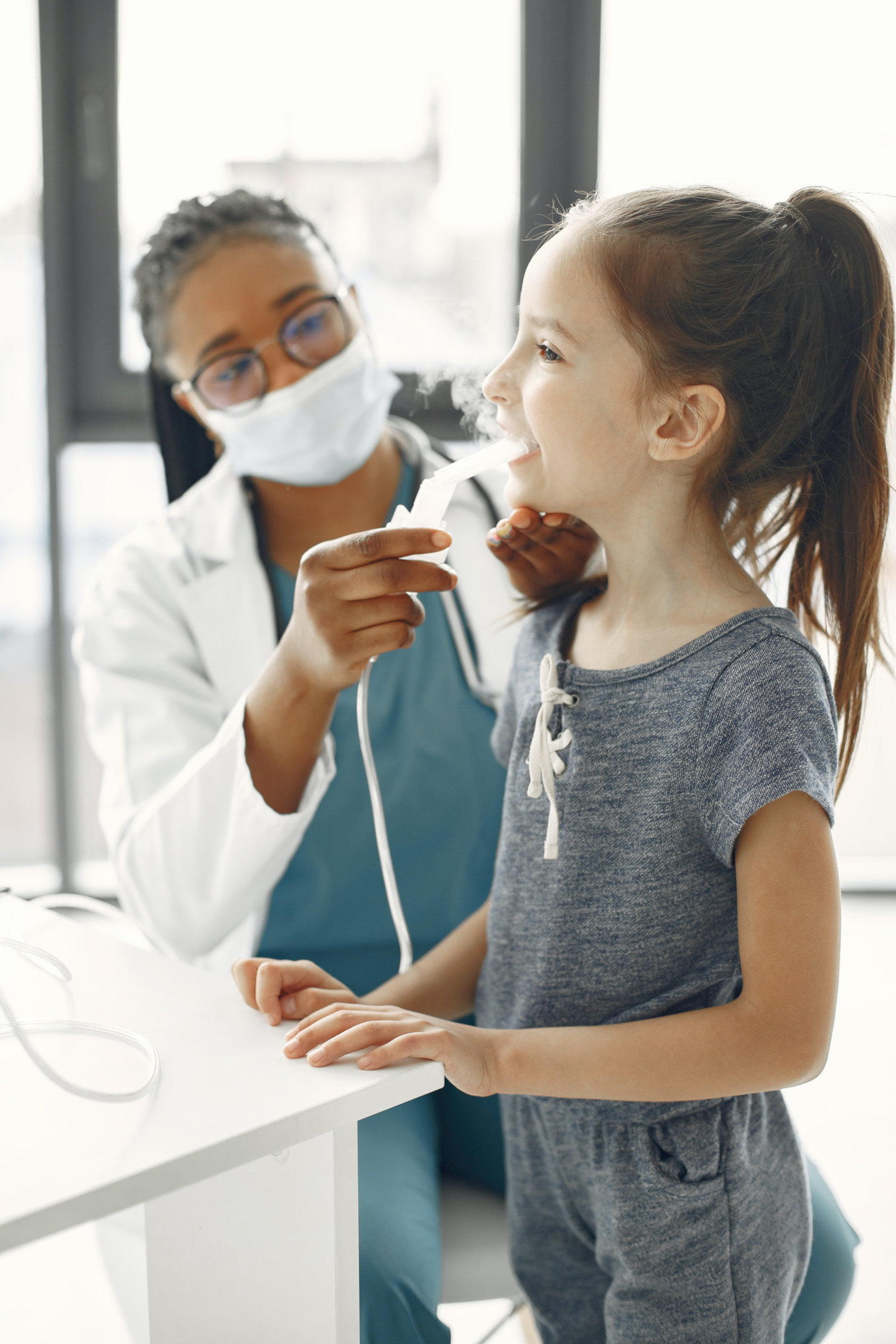 Photo by Gustavo Fring: https://www.pexels.com/photo/a-doctor-giving-medication-to-a-girl-through-a-nebulizer-7447010/
