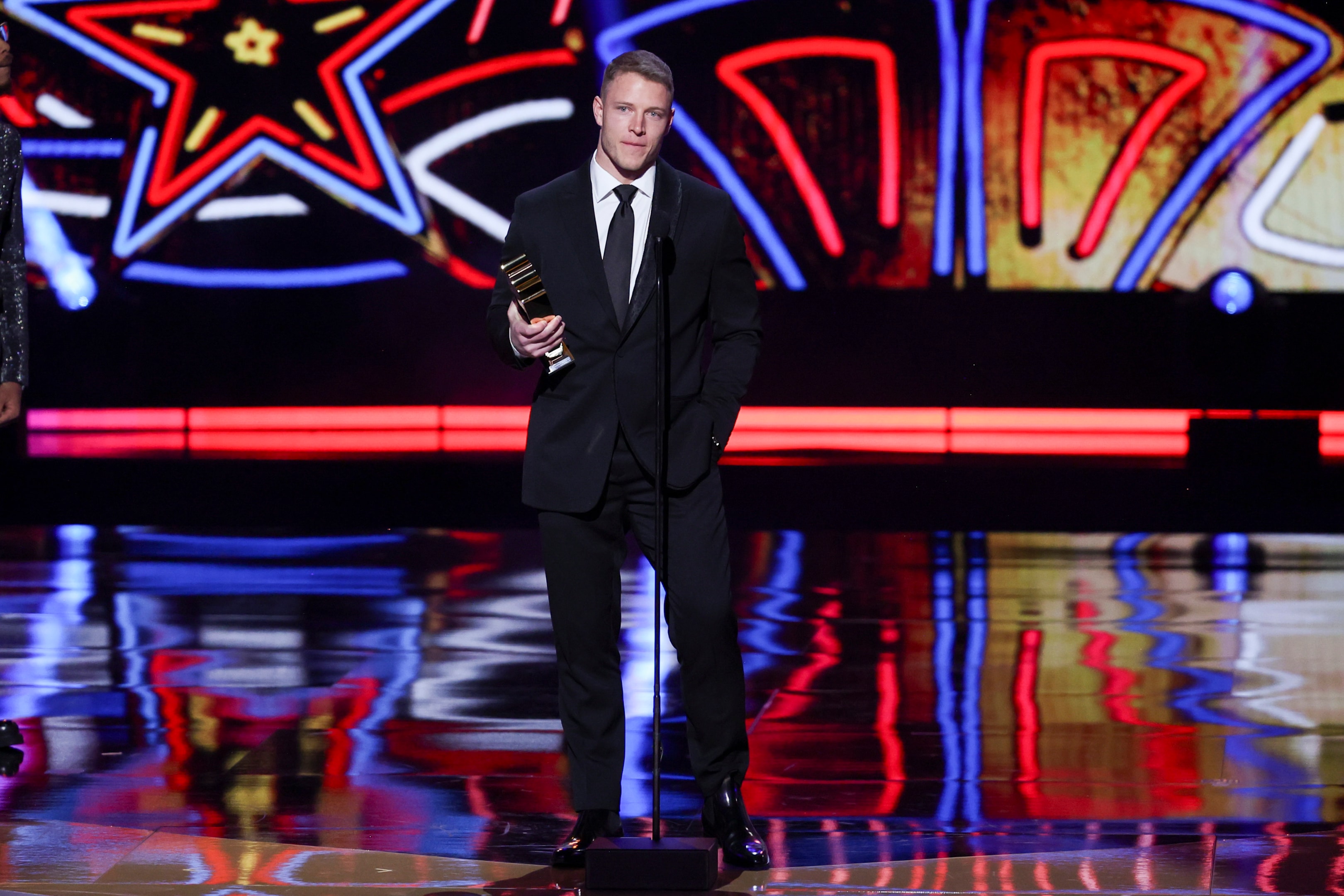 Christian McCaffrey of the San Francisco 49ers accepts the award for Offensive Player of the Year during the 13th Annual NFL Honors on February 8, 2024 in Las Vegas, Nevada.