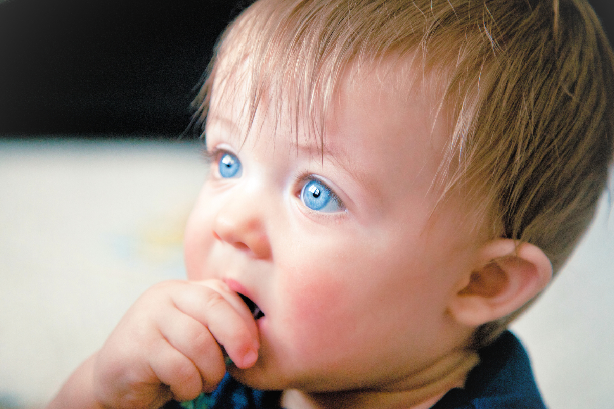 Baby with bright blue eyes