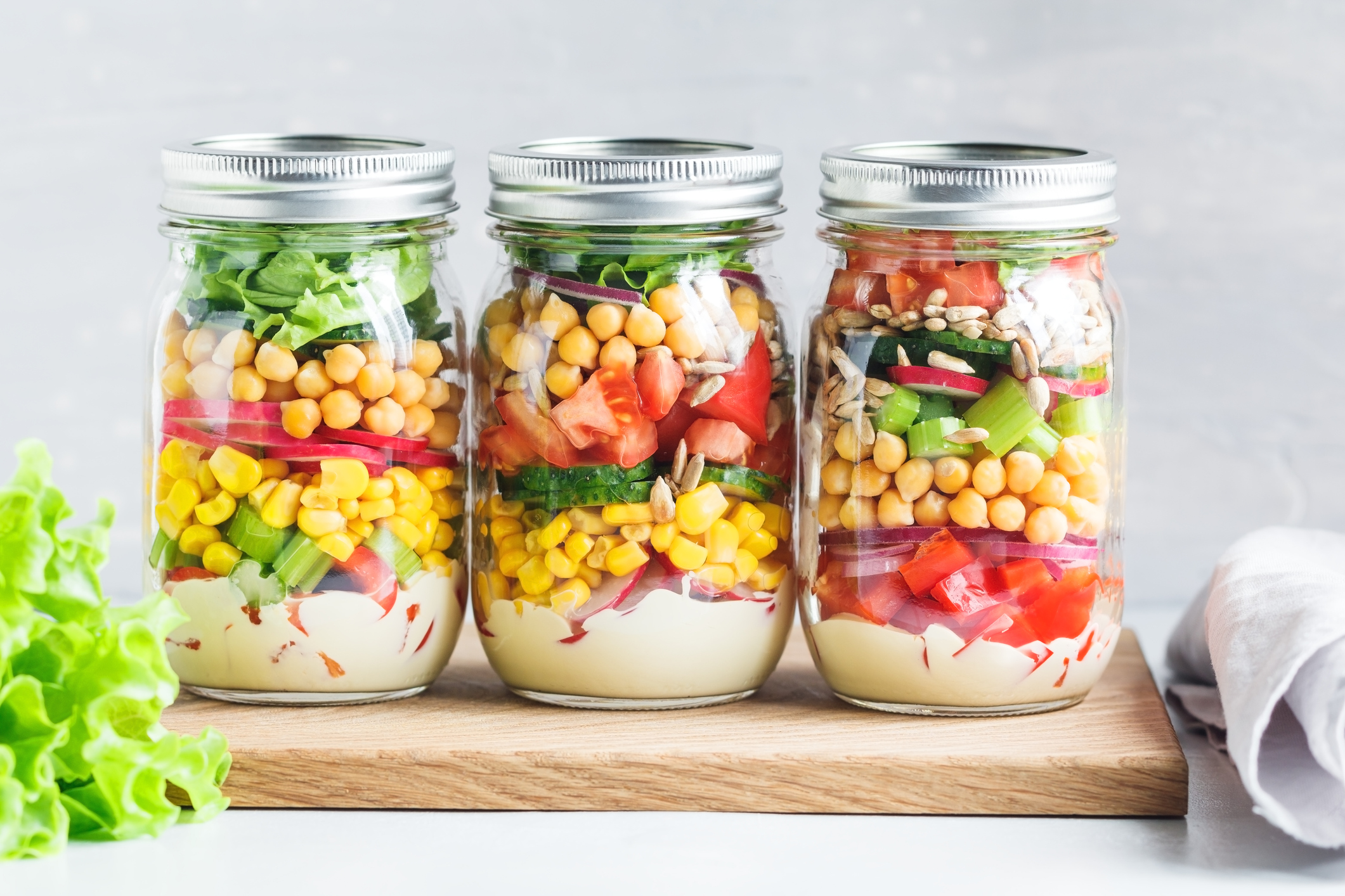 Premade Mason Jar Salads with corn, chickpeas, and other veggies