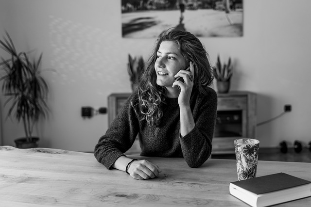 A woman considering divorce mediation on the phone