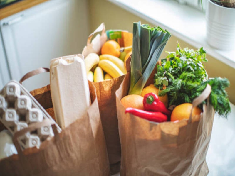 Brown paper bags for carrying groceries. 