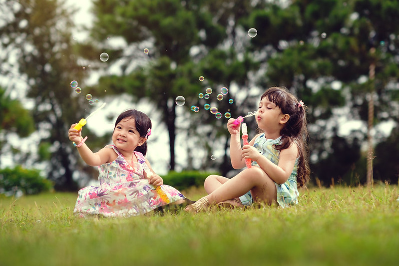 Image of kids playing with bubbles within the luxury community of Crosswinds Tagaytay