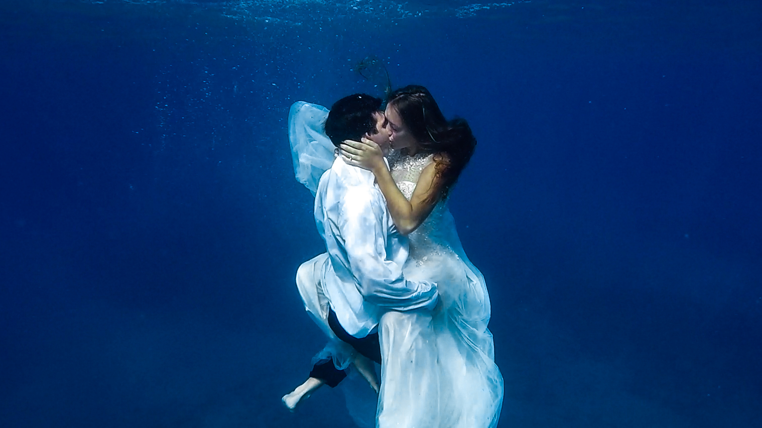 romantic shot underwater trash the dress