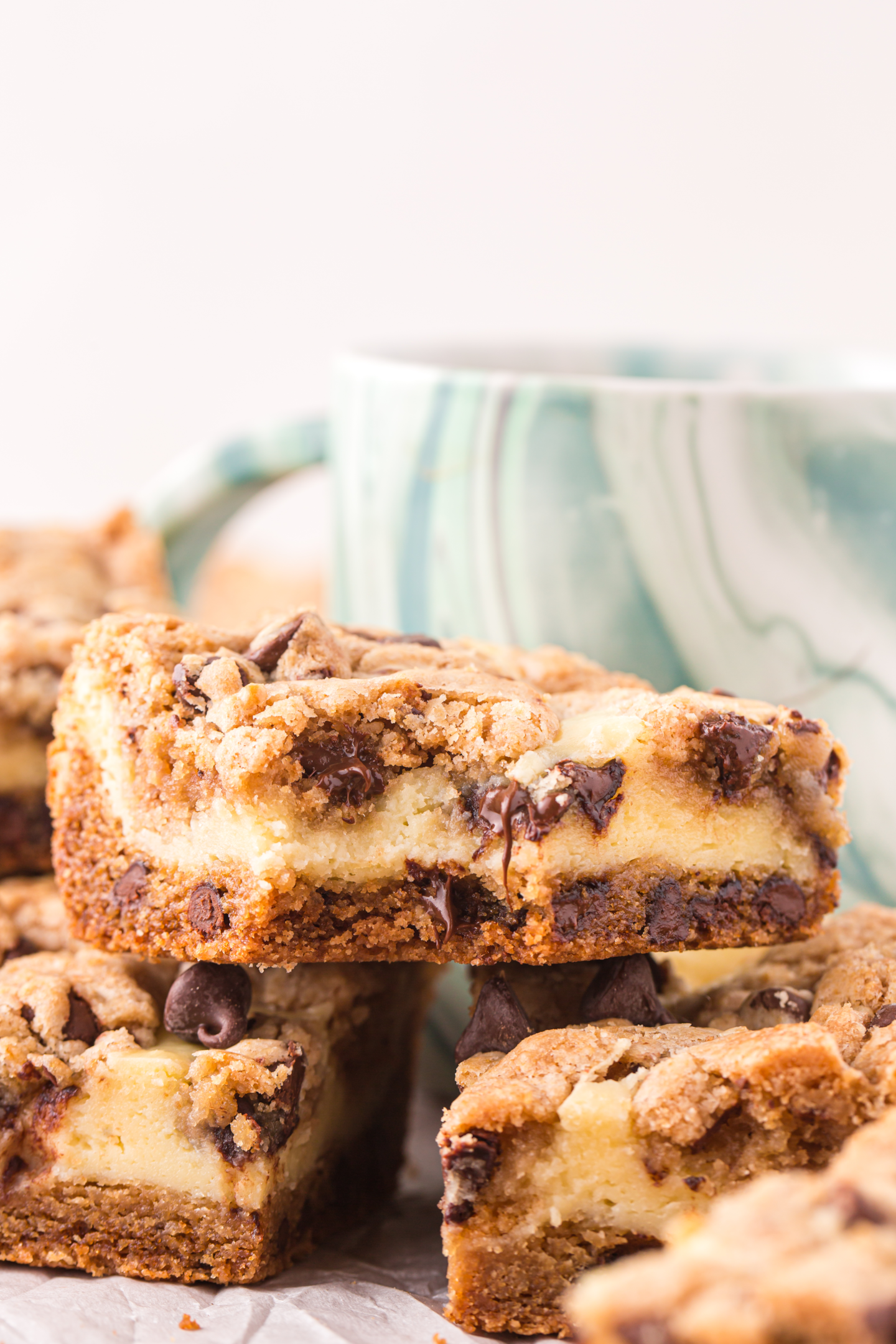 stacked chocolate chip cookie cheesecake bars