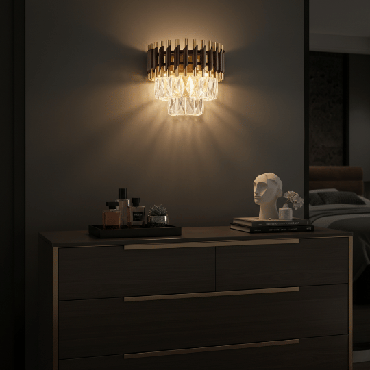 Crystal wall sconce with a dark metal frame adding warm accent lighting above a bedroom dresser.
