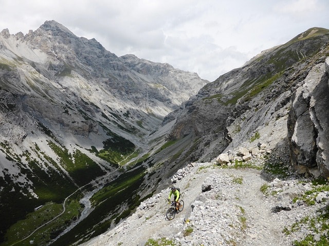 A biker on mountain terrain.