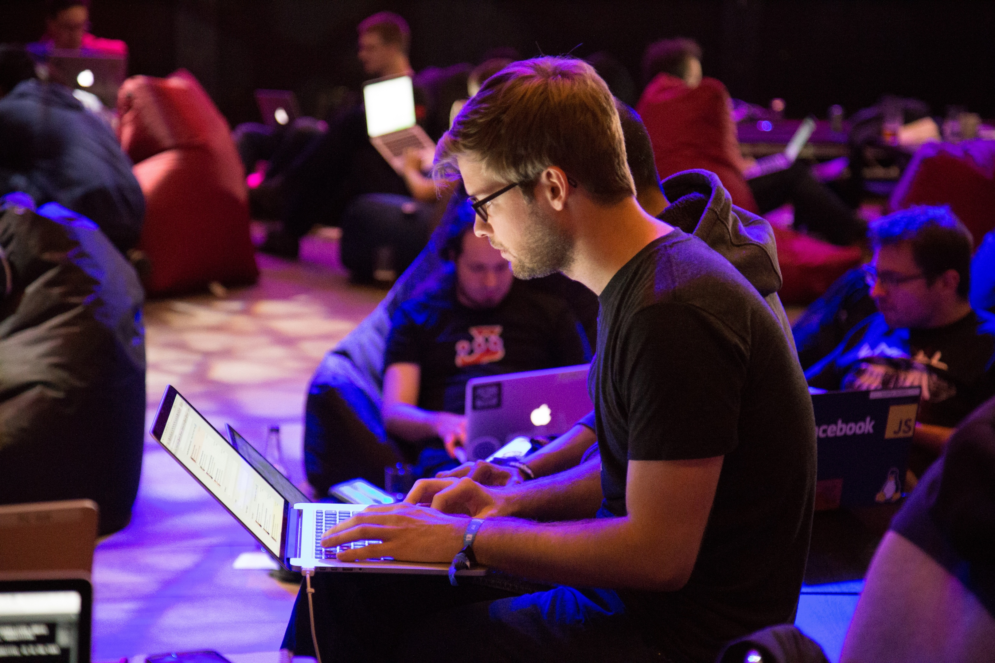 Programmer writing code during a hackathon