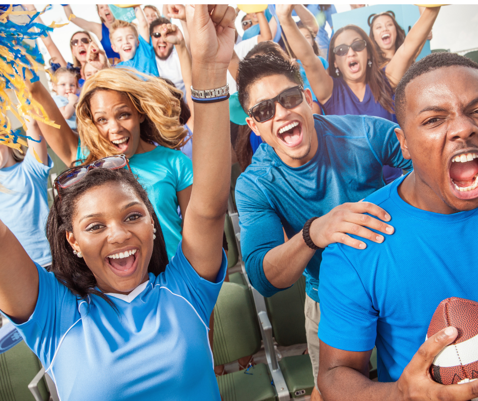 Crowd cheering for their favorite sports team