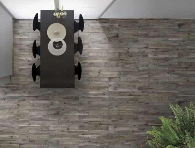 Rondine's Soft Ash glazed porcelain wood effect tiles lend an air of uncluttered simplicity to your kitchen..