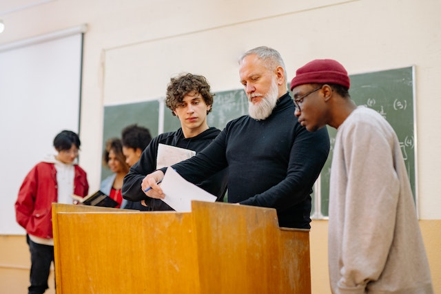 Professor with students