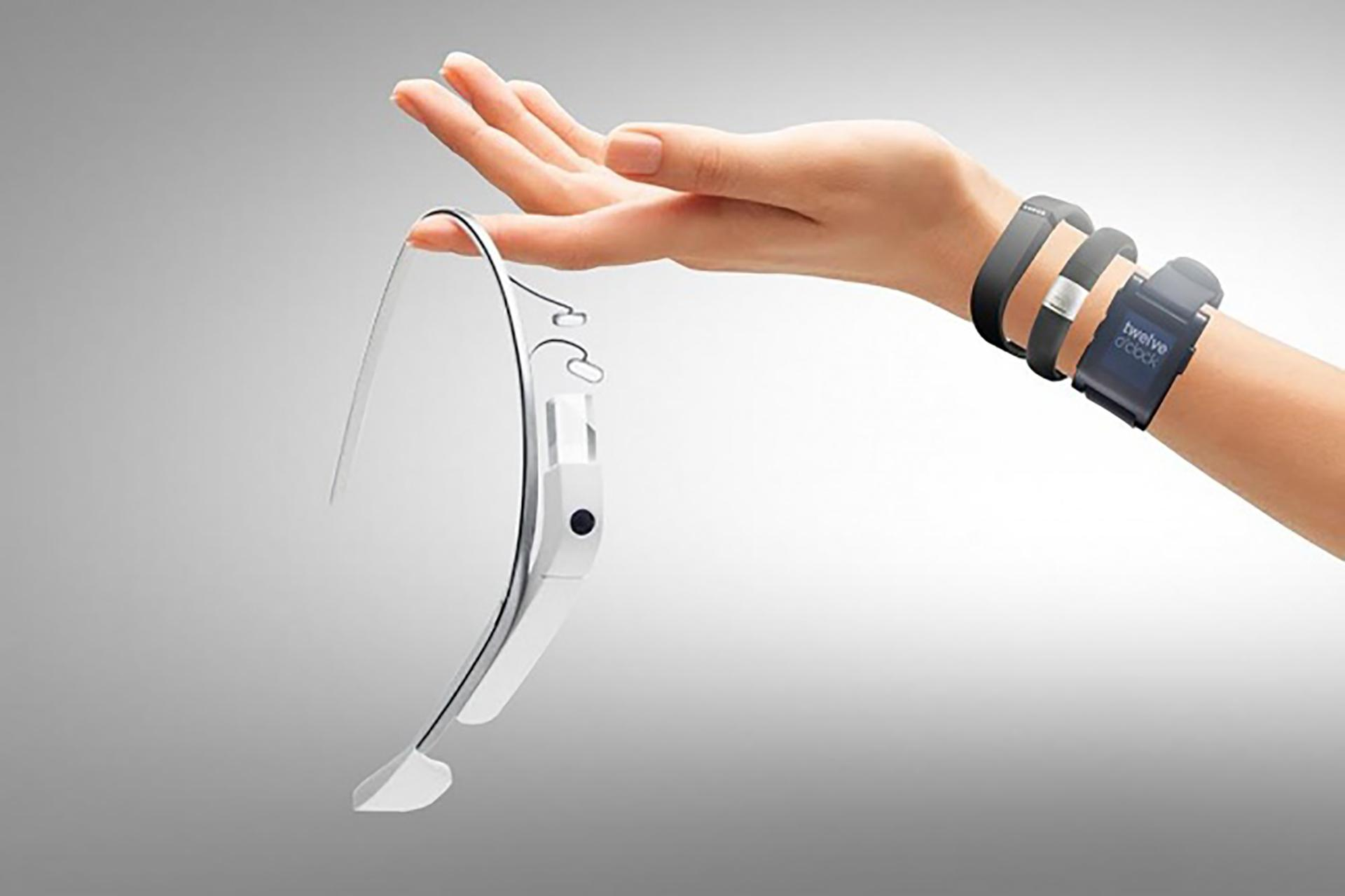 A hand with wearable tech trends from the wearable technology market and has a compound annual growth rate