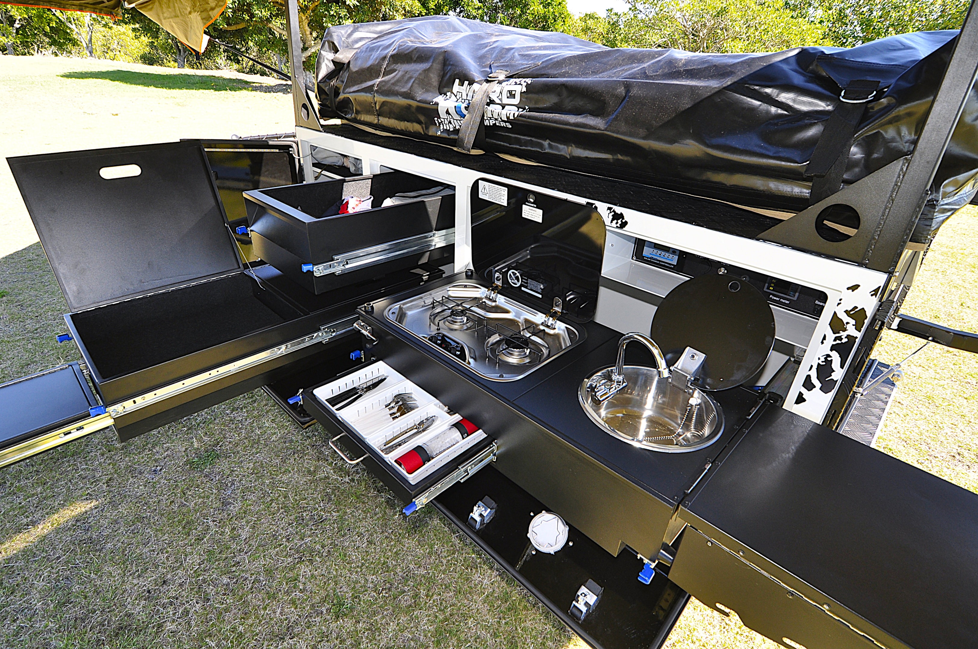 The Overlander GT features an electric water pump, battery monitor, USB outlets and plenty of bench space.