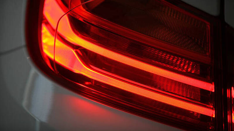 Red tail light of a car. 