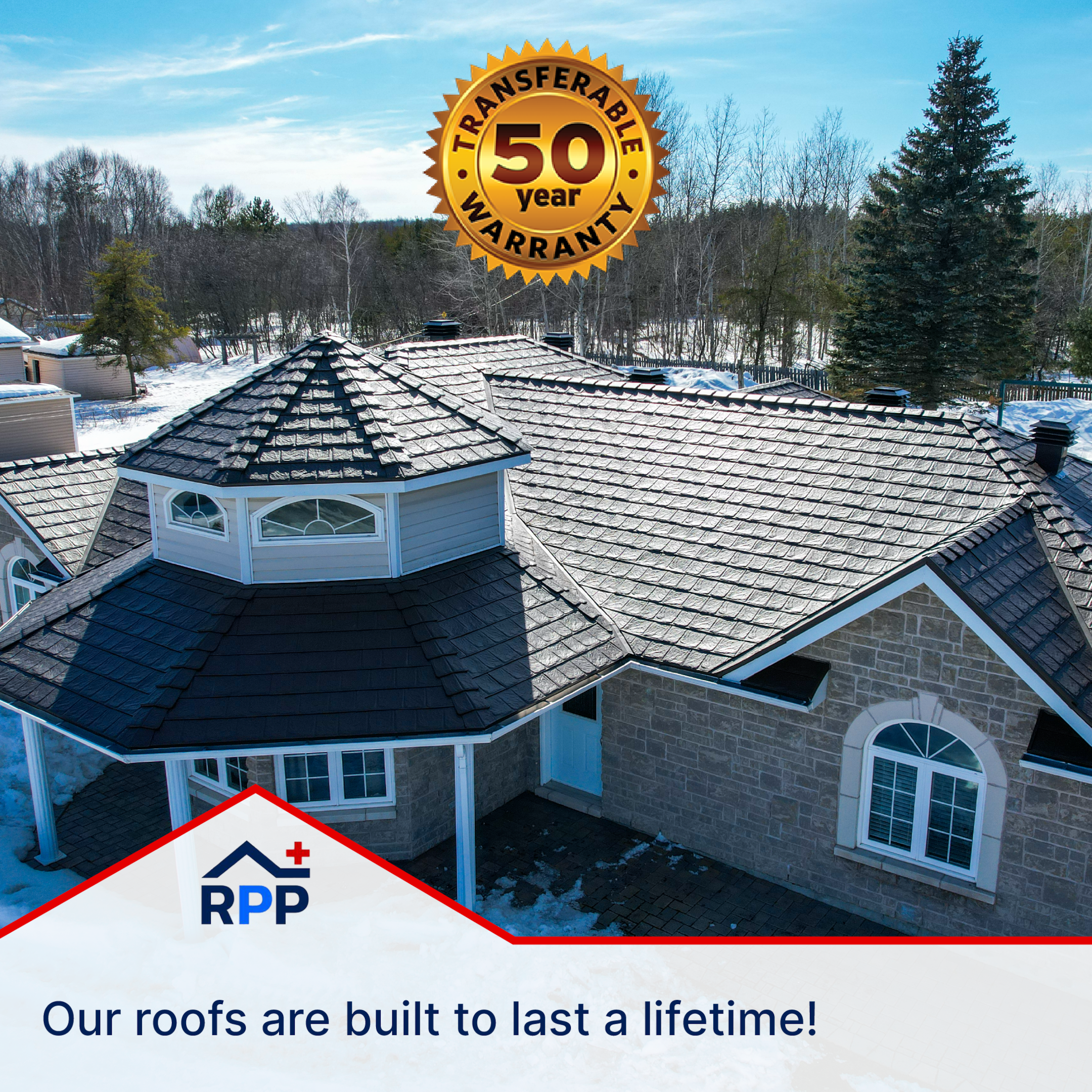 Aerial view of a home with a metal roof surrounded by snowy trees. A "50-year transferable warranty" badge is displayed at the top of the graphic. The text at the bottom of the graphic reads, "Our roofs are built to last a lifetime!"