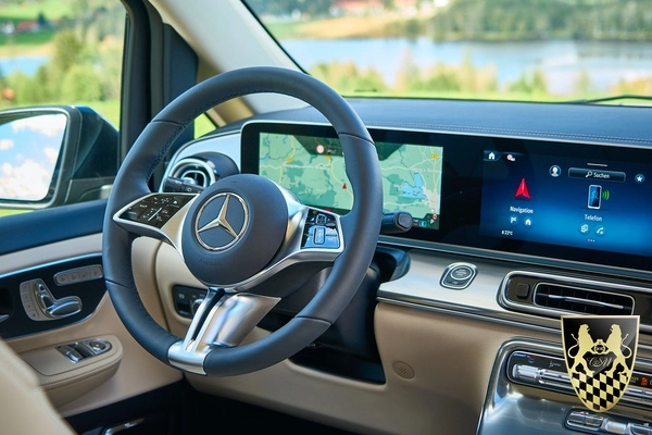 Neuschwanstein Tour Private Driver from Munich 7 The image depicts the luxurious interior of a Mercedes van, featuring plush leather seats and modern amenities designed for comfort. This spacious vehicle is ideal for a private tour, offering a pleasant way to explore iconic landmarks like Neuschwanstein Castle and Hohenschwangau Castle with an English-speaking driver.