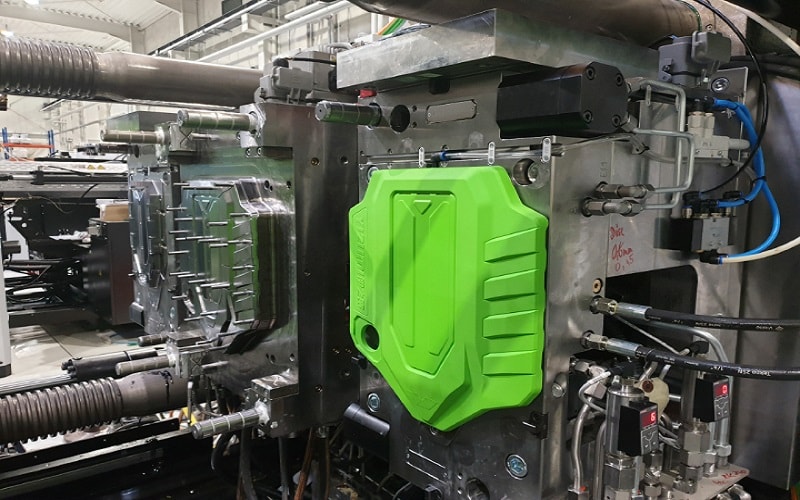 overmolding process with TPV materials shown in a manufacturing setup