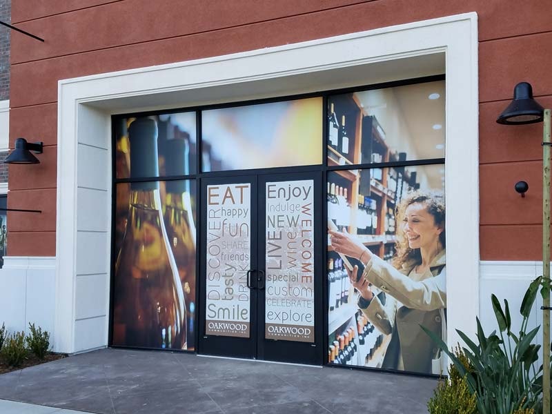 Custom window graphics hint at what’s coming to Wagon Wheel, sparking interest from customers and attracting potential businesses to the growing community.