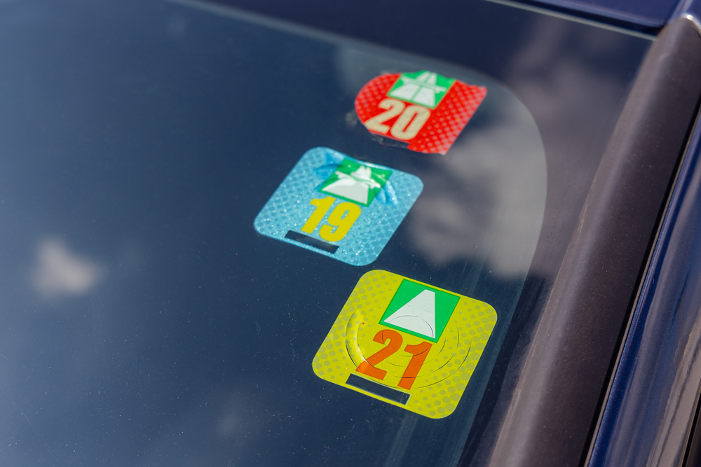 Three Swiss Road Tax Stickers Vignette at Car Windshield
