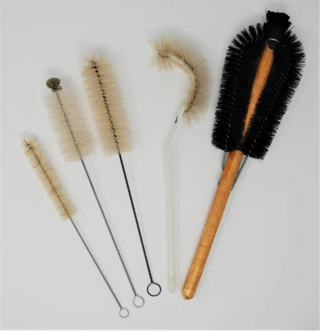 Assortment of laboratory brushes including cylinder brushes and test tube brushes