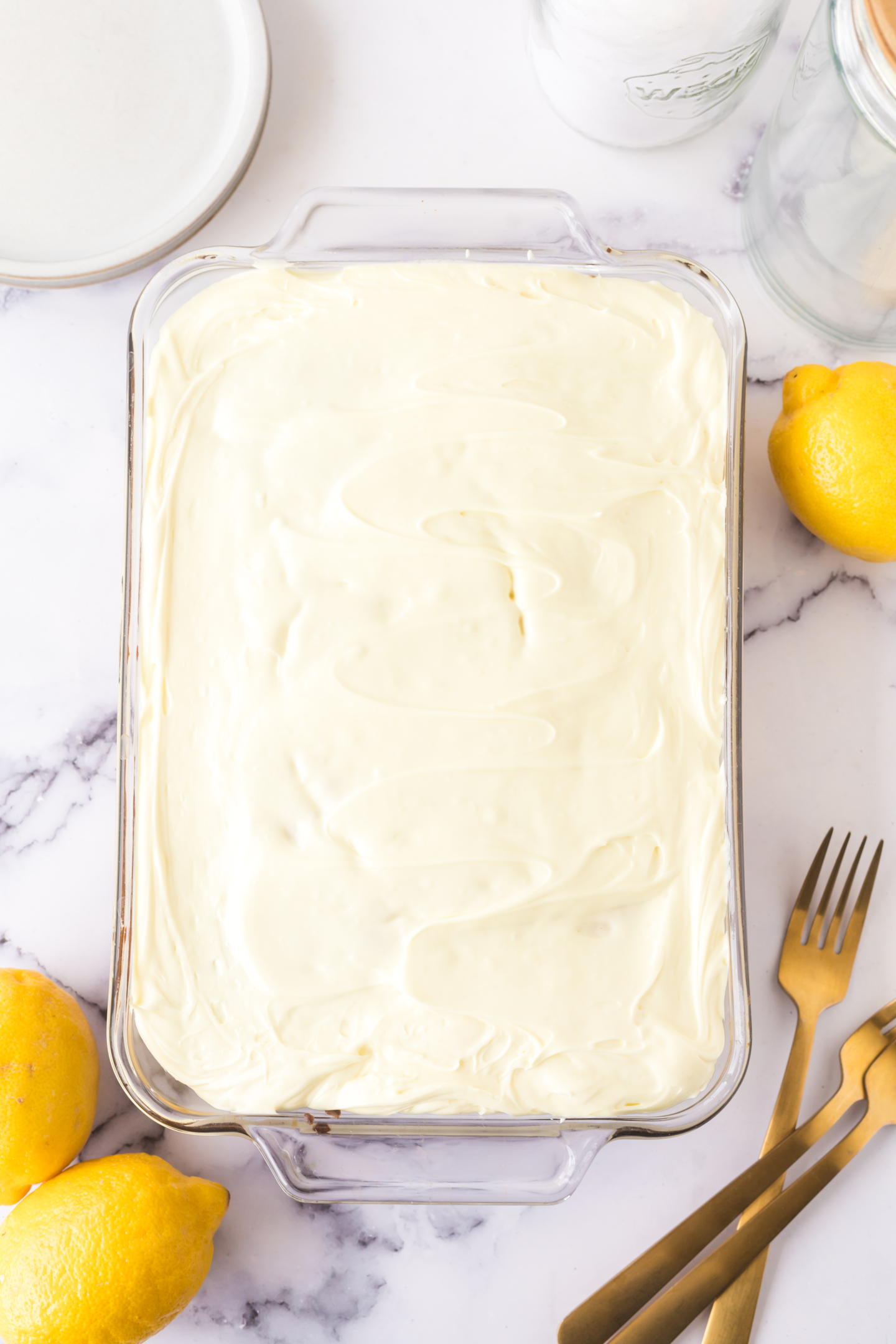 frosted lemon cake in baking pan