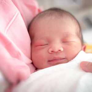 Happy baby who received regular chiropractic adjustments 