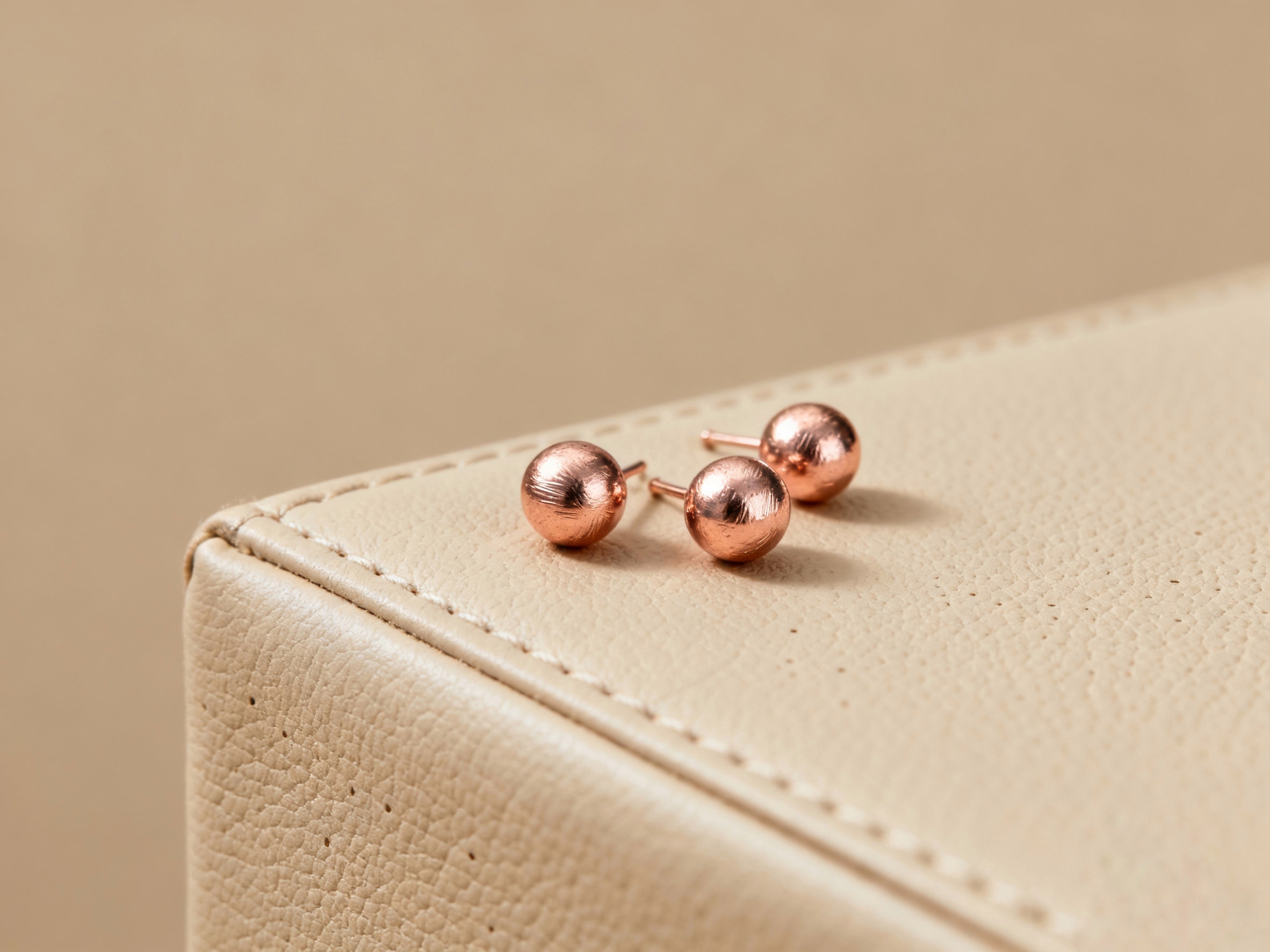 Rose gold round ball studs earrings.