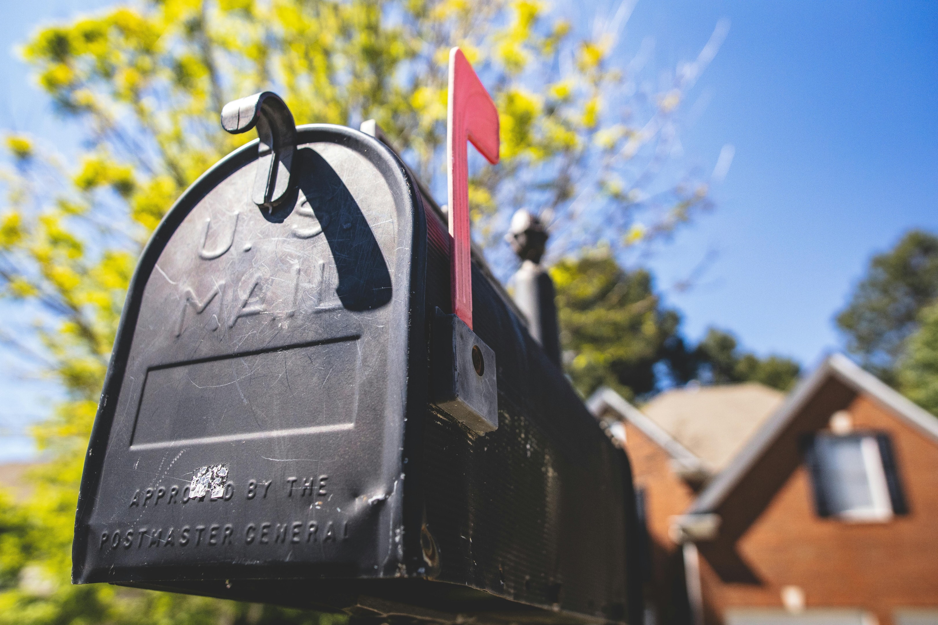 Mailbox in front of single family house targeted by real estate investor. 