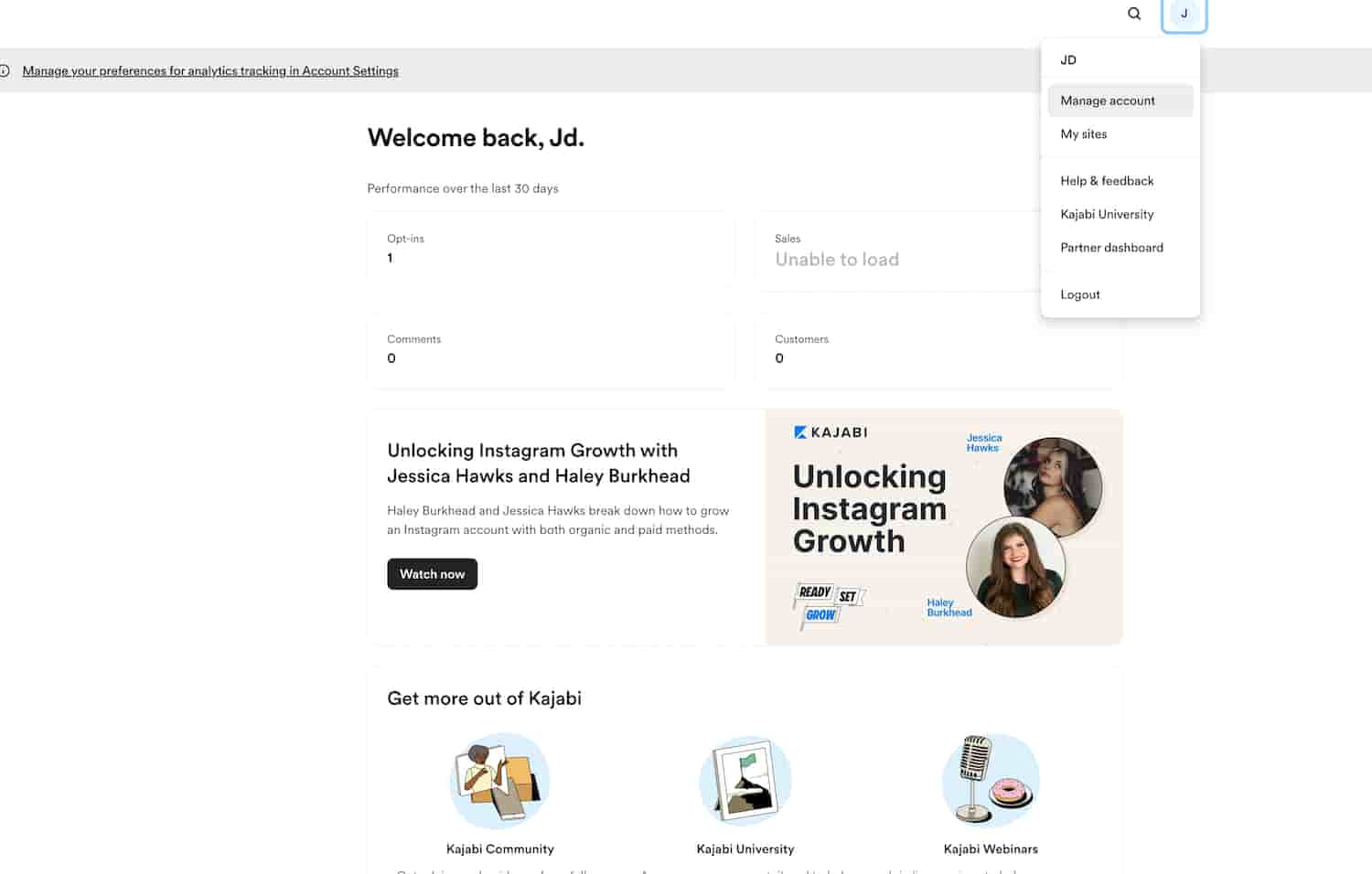 Kajabi homepage with the user menu open