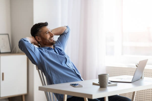 Man relaxing in his home in Rotterdam