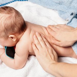 Picture of a newborn receiving gentle chiropractic care