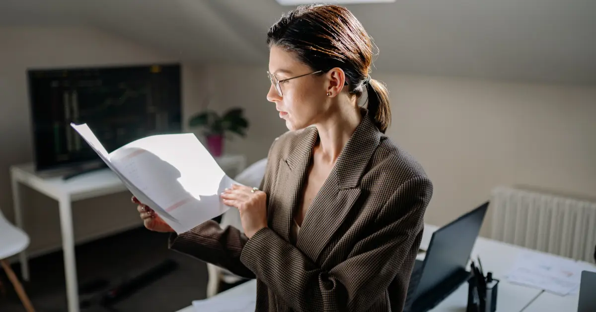 OnlyFans creator comparing LLC sole proprietorship and S Corp documents to define business entity.