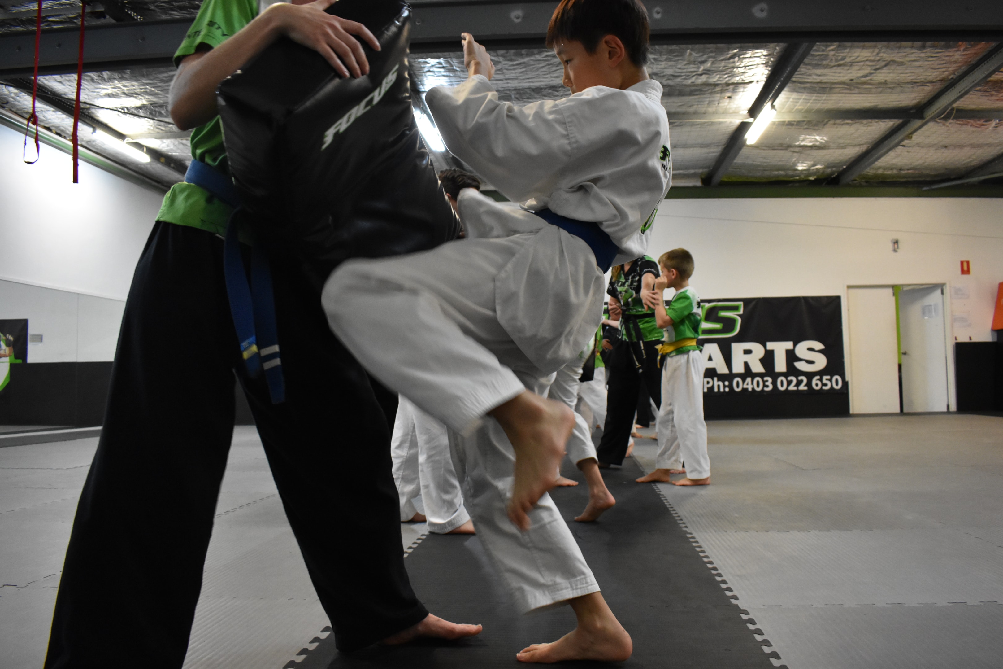 students learn self control and a strong sense with tae kwon do