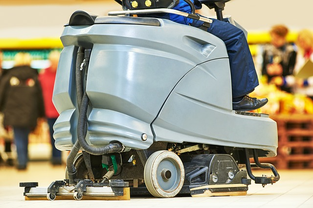 Commercial floor scrubber. Ride on.