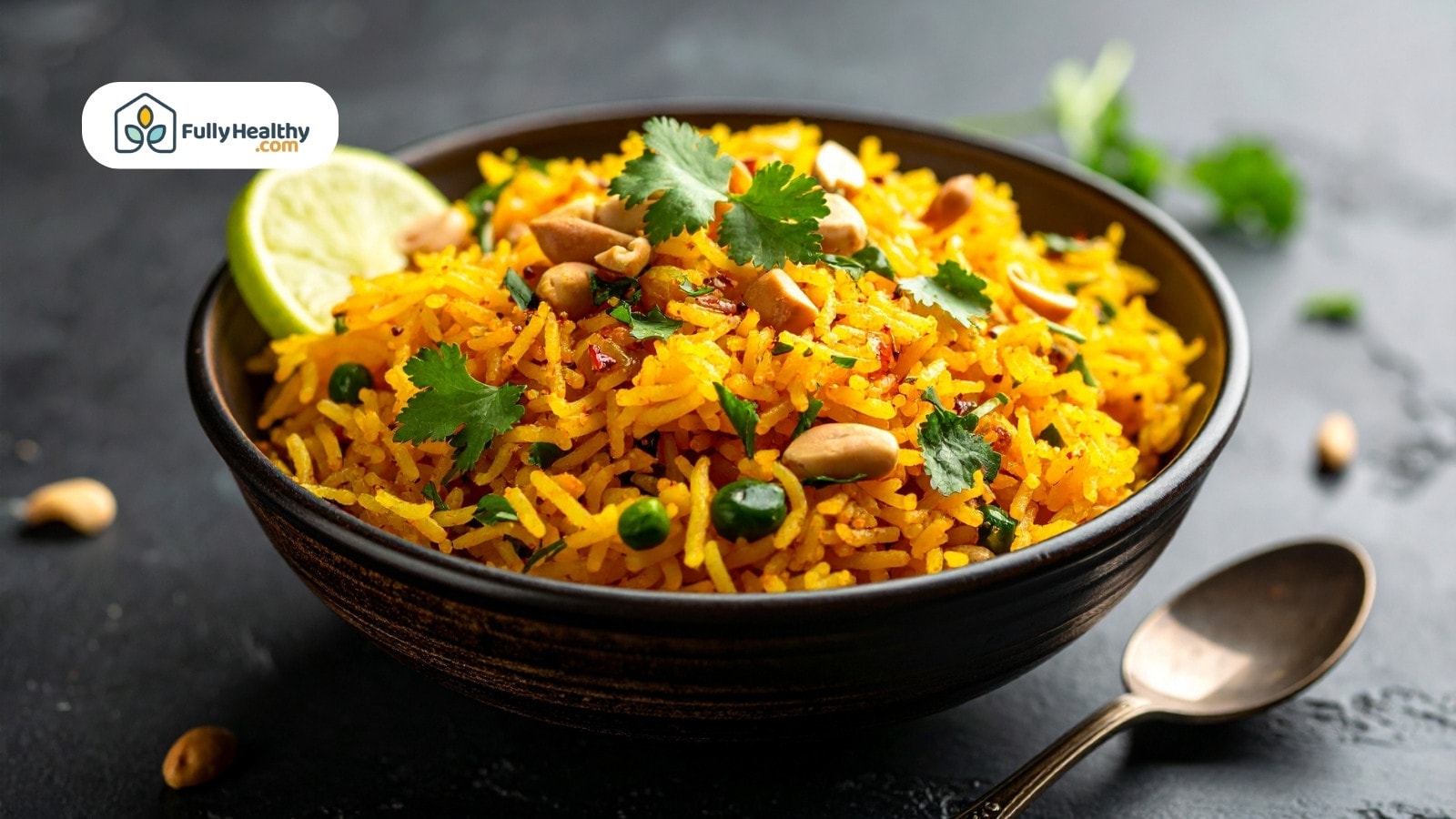 Spiced yellow rice bowl with cilantro peanuts lime and green peas