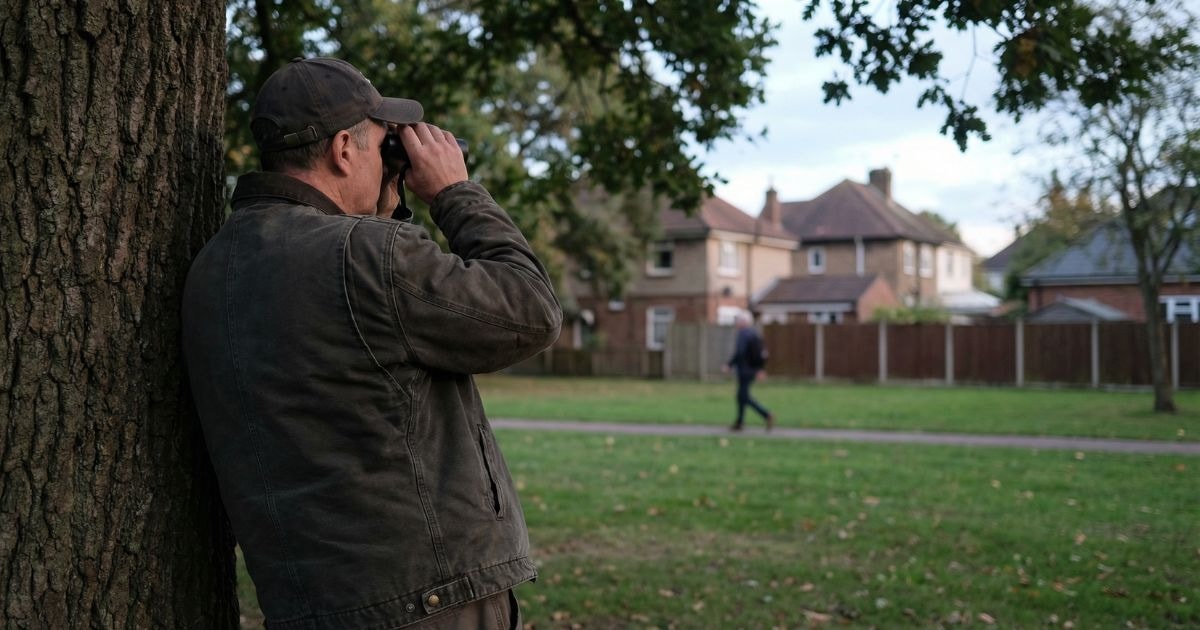 Private investigator conducting discreet surveillance for infidelity investigation in Orange County