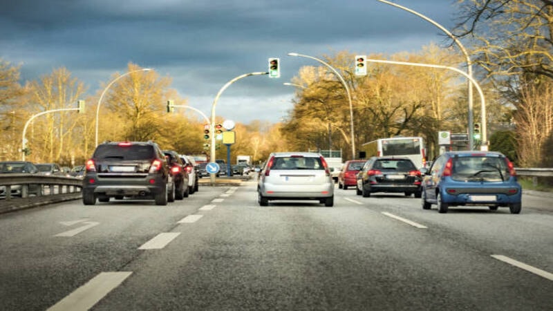 Hazard lights of cars on the road for interaction to other drivers 