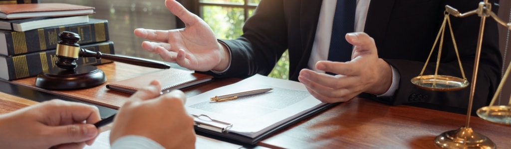 A Michigan bankruptcy lawyer advises a client on who pays for bankruptcies in joint filings versus individual cases.