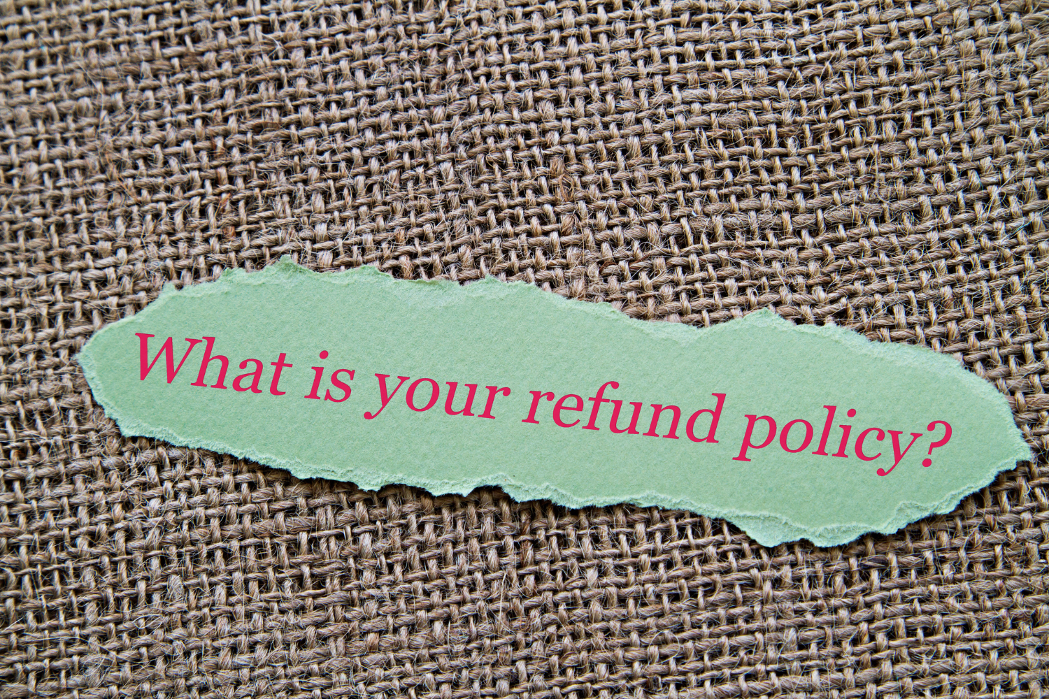 A paper with a question "What is your refund policy?"