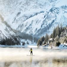 paddle board in the snow