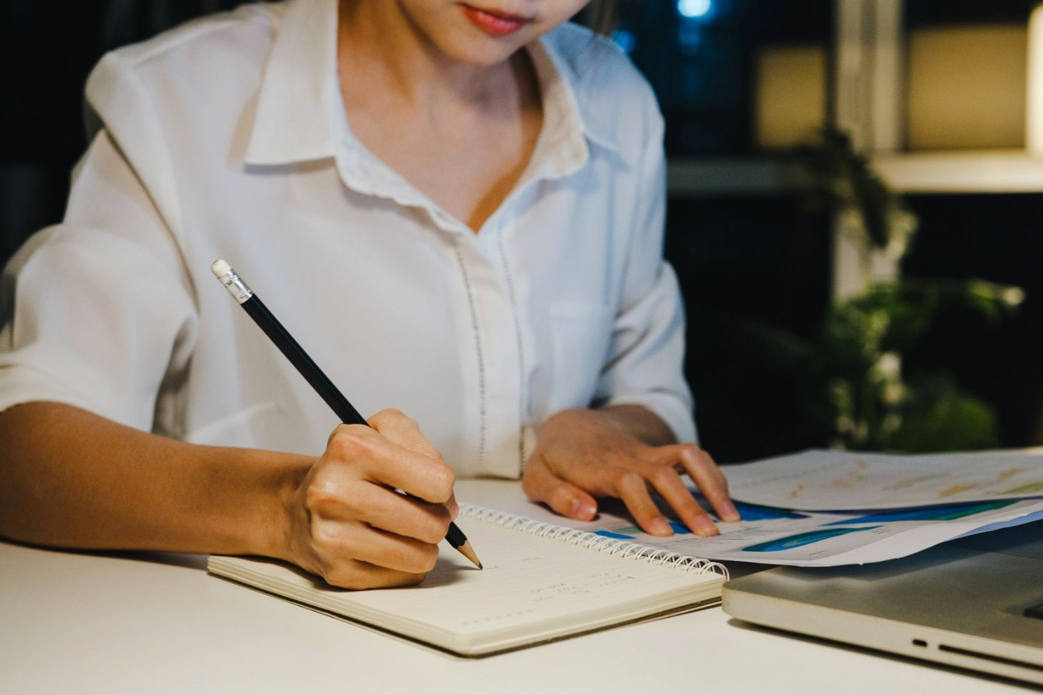 woman writing to do list