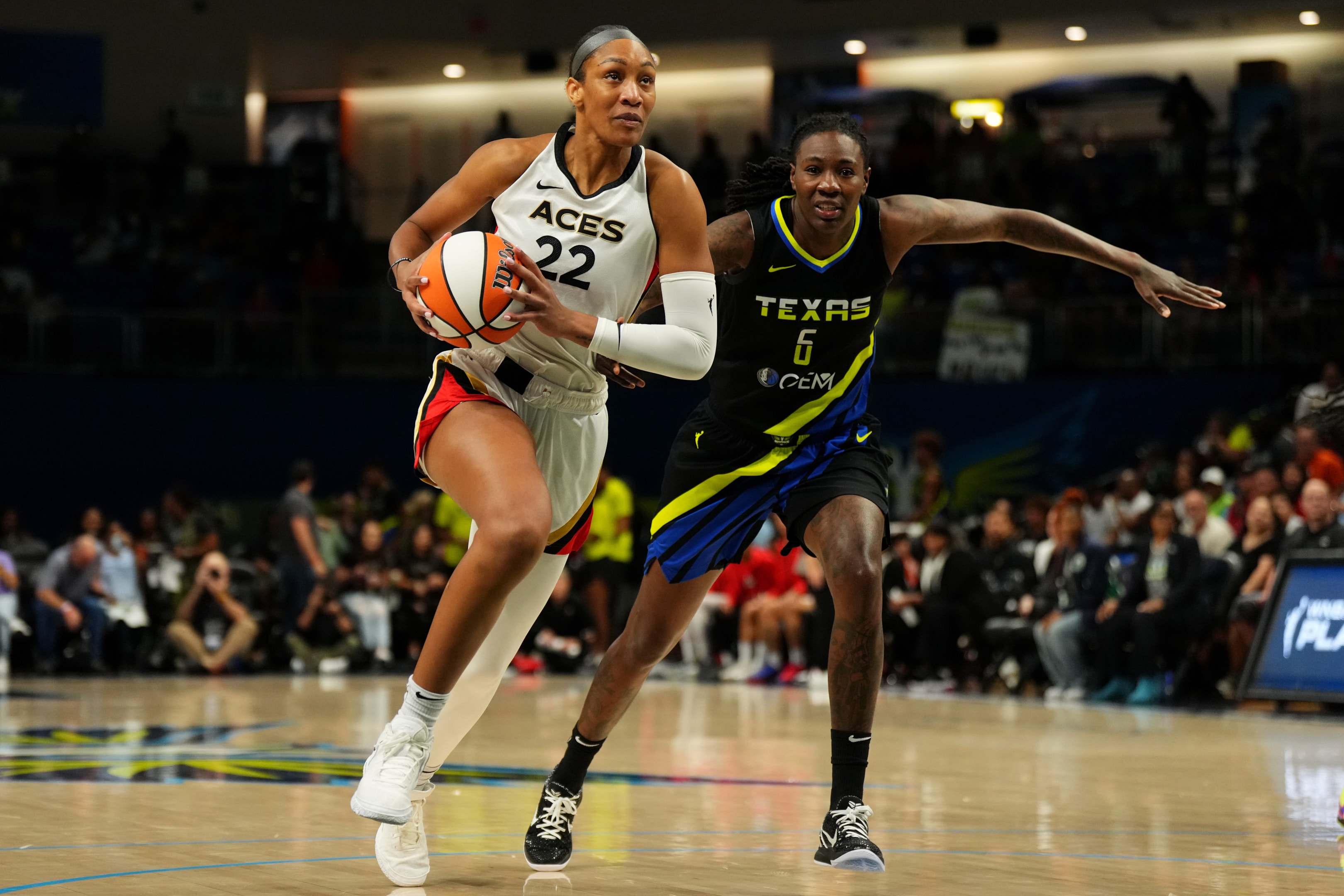 A'ja Wilson #22 of the Las Vegas Aces drives to the basket during a WNBA game against the Dallas Wings.