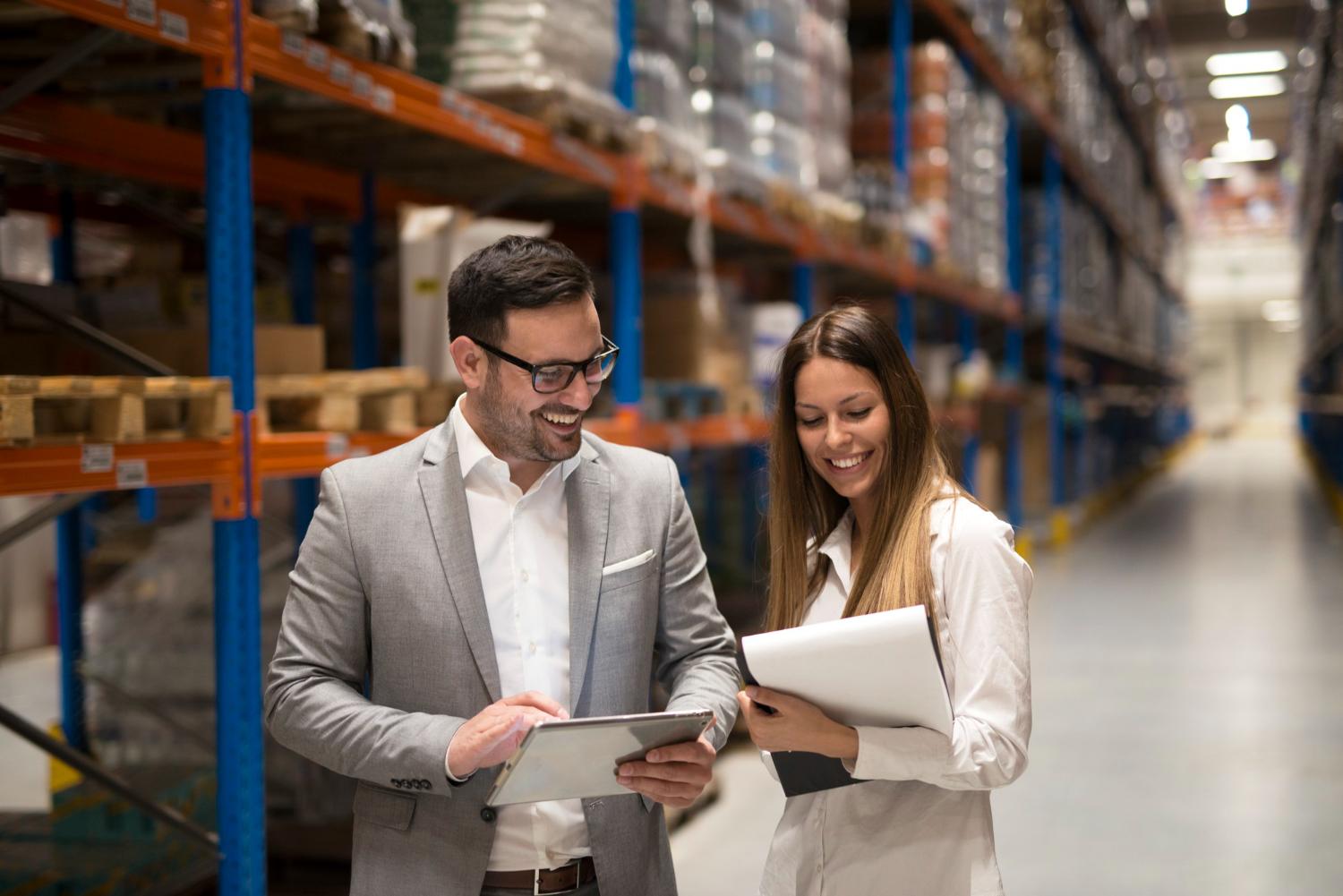 man and woman looking for good suppliers
