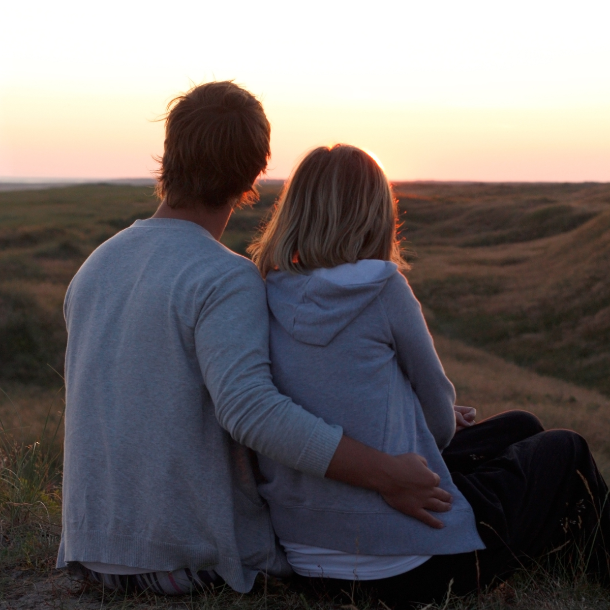 Couple watching the sunset together: Featured in: Learn to stop catching feelings so quickly
