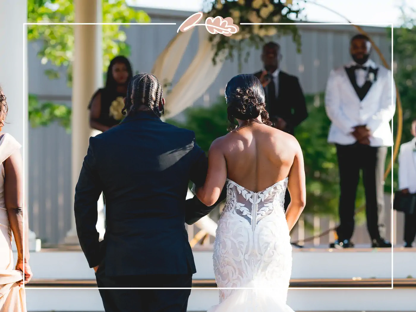 Bride and groom walking down the aisle during their outdoor wedding ceremony. Fabulous Flowers & Gifts