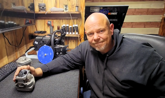 Jon in his workshop, who uses an HM126 saw mill to turn logs into lumber for his customers. 