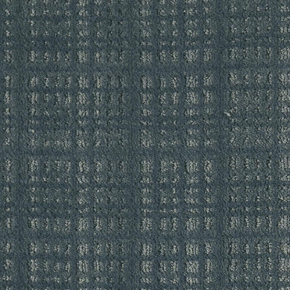 blue and beige grid patterend carpet